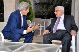  U.S. Secretary of State John Kerry sits with Palestinian Authority President Mahmoud Abbas before they meet and celebrate iftar, the breaking of the daily fast during the Islamic holy month of Ramadan, in Amman, Jordan, on July 16, 2013. Credit: U.S. Department of State. 