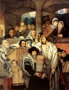 A depiction of Jews praying in synagogue on Yom Kippur. Thirty-two countries have asked the U.N. to recognize Yom Kippur as an official holiday. Credit: Maurycy Gottlieb via Wikimedia Commons.