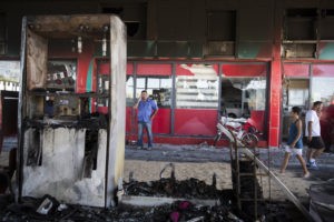 The scene of a gas station in Ashdod that was hit directly by rocket fire from Gaza on the fourth day of Operation Protective Edge, July 11, 2014. Credit: Hadas Parush/Flash90.