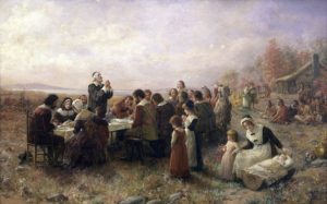 "The First Thanksgiving at Plymouth," by Jennie A. Brownscombe. JNS.org examines whether Thanksgiving was shaped by Sukkot. Credit: Jennie Augusta Brownscombe via Wikimedia Commons.